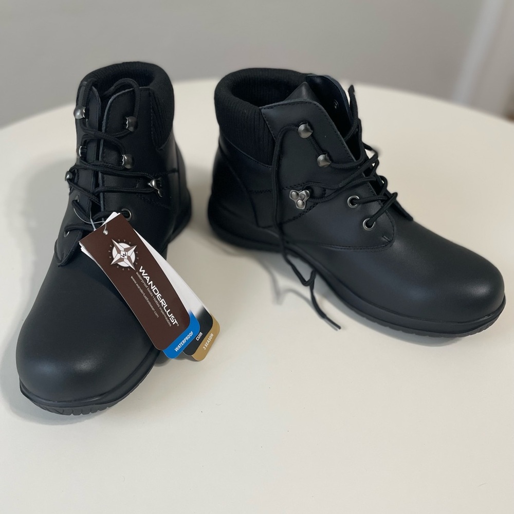 Wanderlust Sleek Black Waterproof Boots
